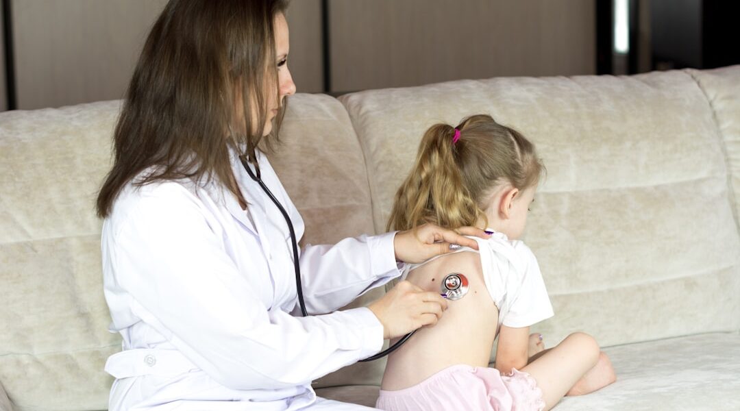 A doctor administering a vaccine to a child in a healthcare setting