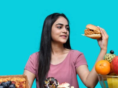 Healthy and unhealthy food choices representing the global obesity crisis affecting 2.5 billion adults worldwide