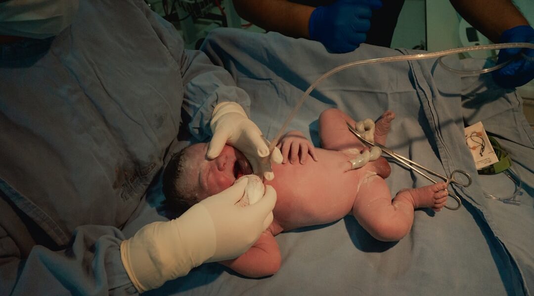 Newborn baby receiving neonatal care in hospital — reducing neonatal mortality in India