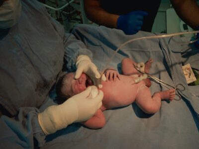 Newborn baby receiving neonatal care in hospital — reducing neonatal mortality in India