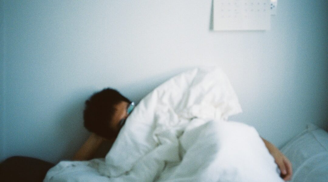 Person sleeping representing sleep deprivation and its health impacts in India