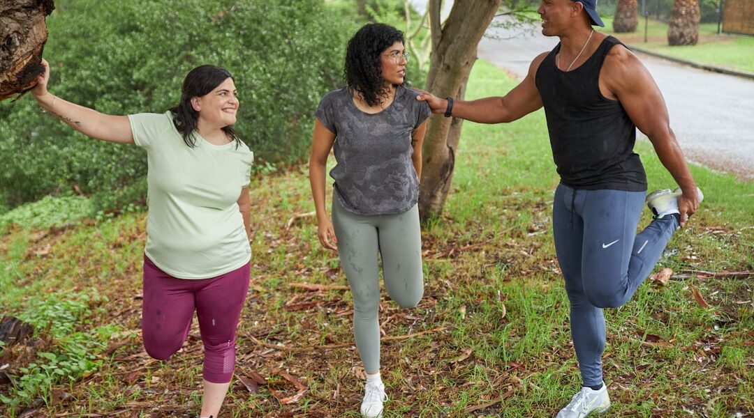 Young adults stretching and preparing for a run — research shows that obesity before age 30 significantly raises the risk of premature death from cardiovascular disease, diabetes and cancer