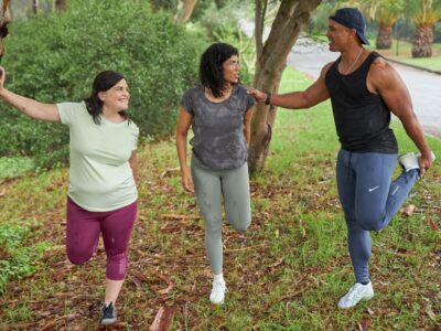 Young adults stretching and preparing for a run — research shows that obesity before age 30 significantly raises the risk of premature death from cardiovascular disease, diabetes and cancer