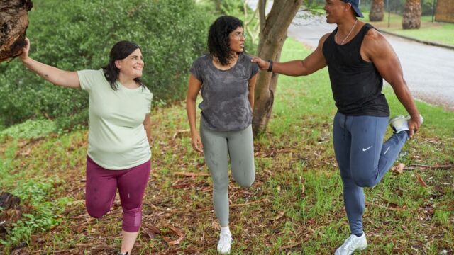 Young adults stretching and preparing for a run — research shows that obesity before age 30 significantly raises the risk of premature death from cardiovascular disease, diabetes and cancer